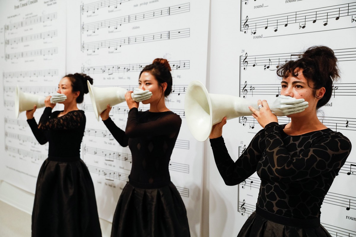 documentation of a performance of "Silent Room" by Micaela Tobin and Sharon Chohi Kim, September 29, 2018